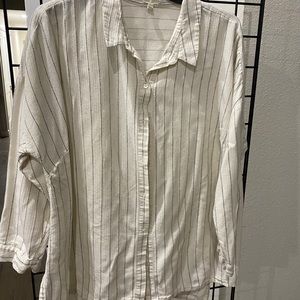 Cream colored button down shirt